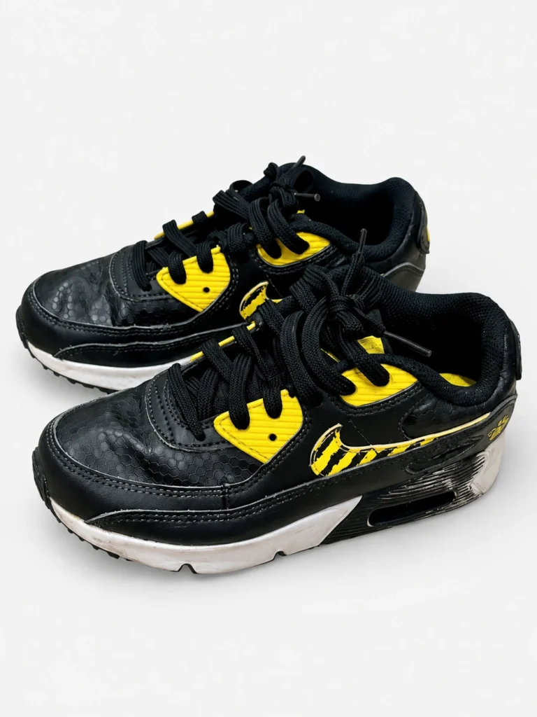 Nike black and yellow shoes, EU 28, pair with visible signs of wear