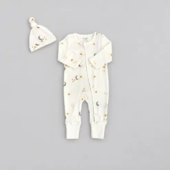 Le Petit Society ivory zip sleepsuit and matching hat with moon and star print, size 1 to 3 months